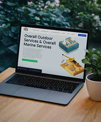 Website design for Overall Outdoor Services displayed on a laptop.