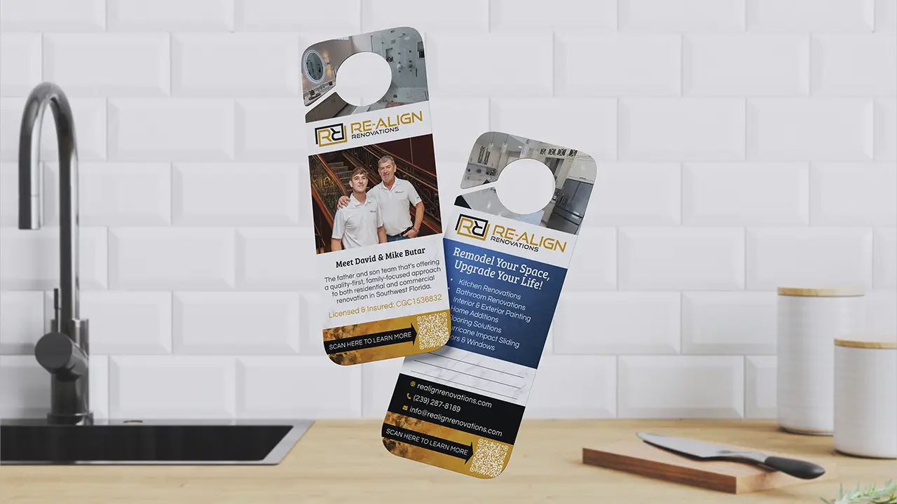 Door hangers for Re-Align Renovations mocked up inside a bright clean kitchen.
