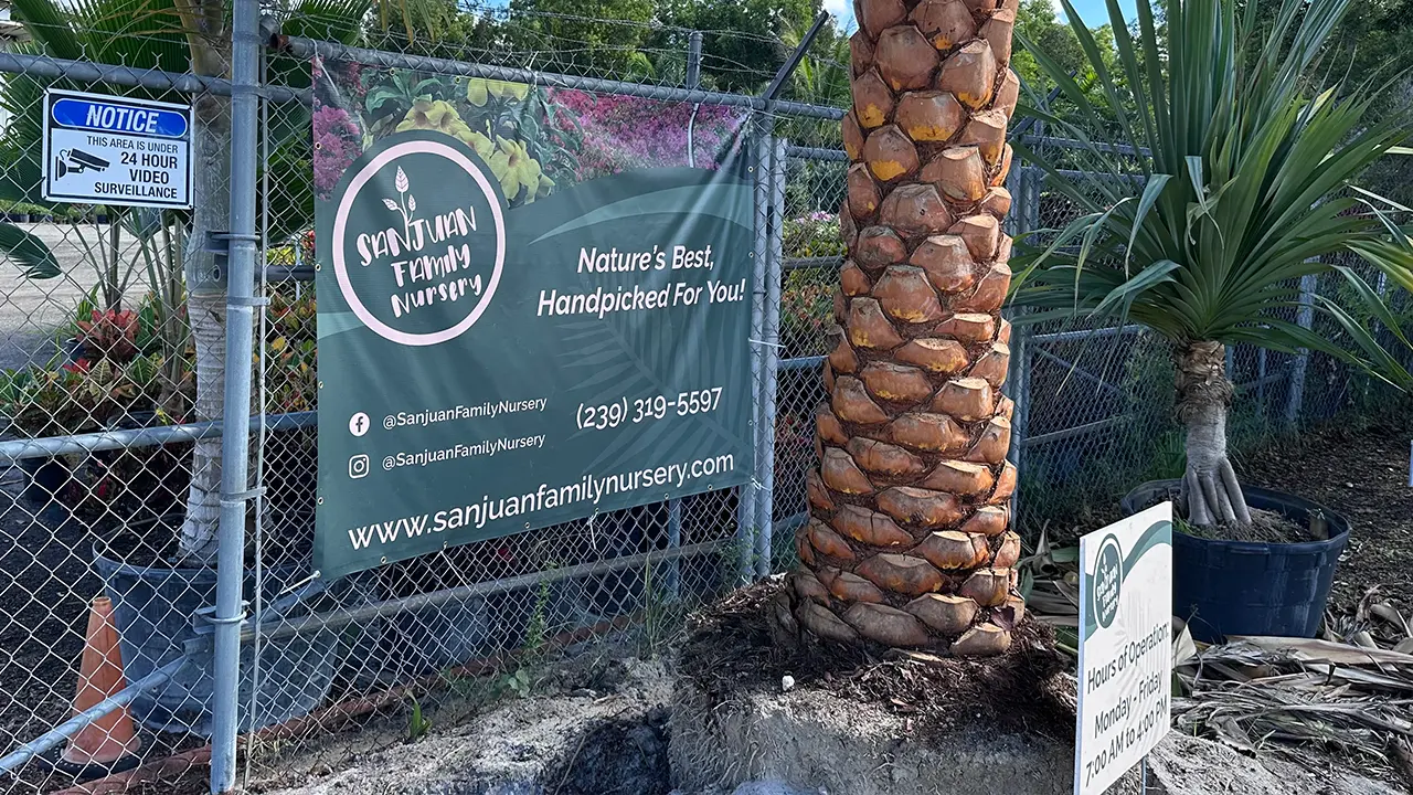Sanjuan Family Nursery gate sign and hours of operation sign.
