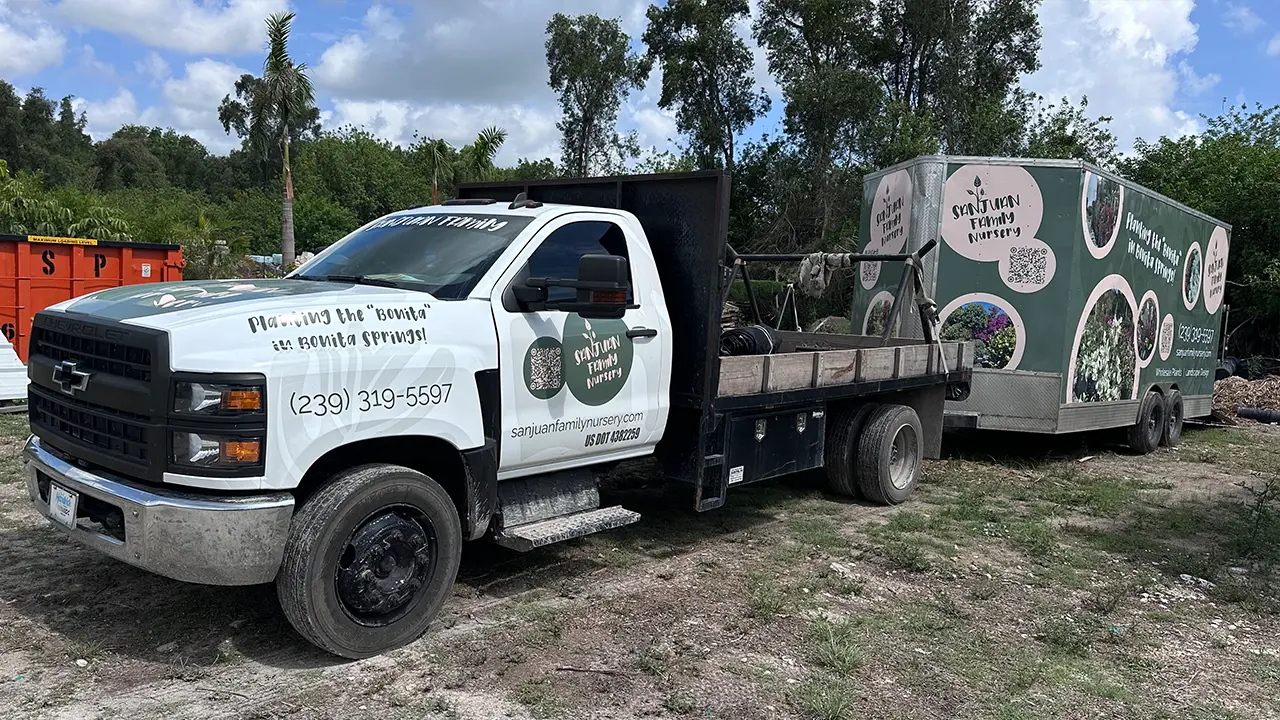 Chevy truck and trailer featuring custom wraps and decals for Sanjuan Family Nursery.